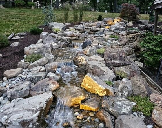 Layered foundation planting and mulched beds