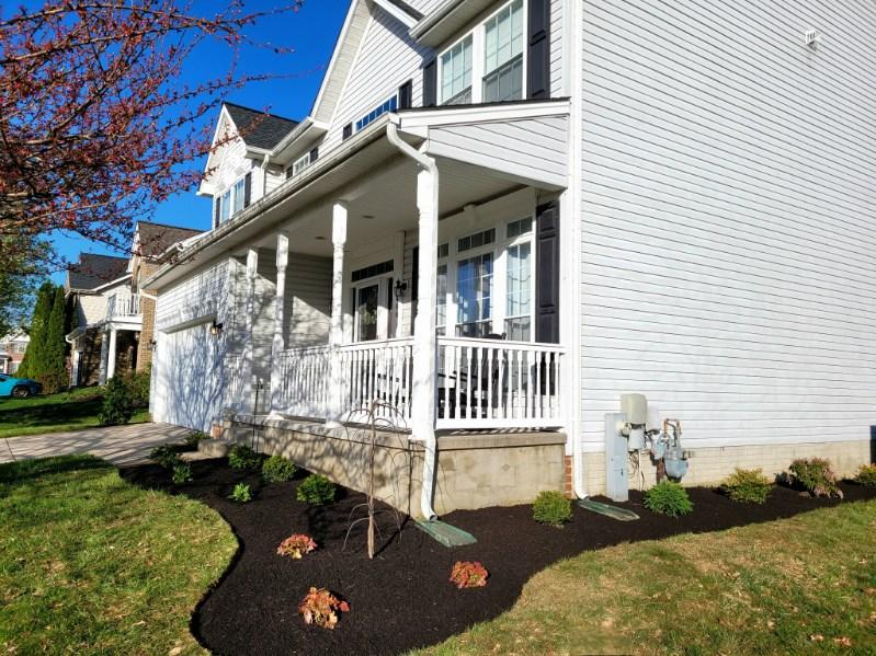 Mature plantings framing a residential entry