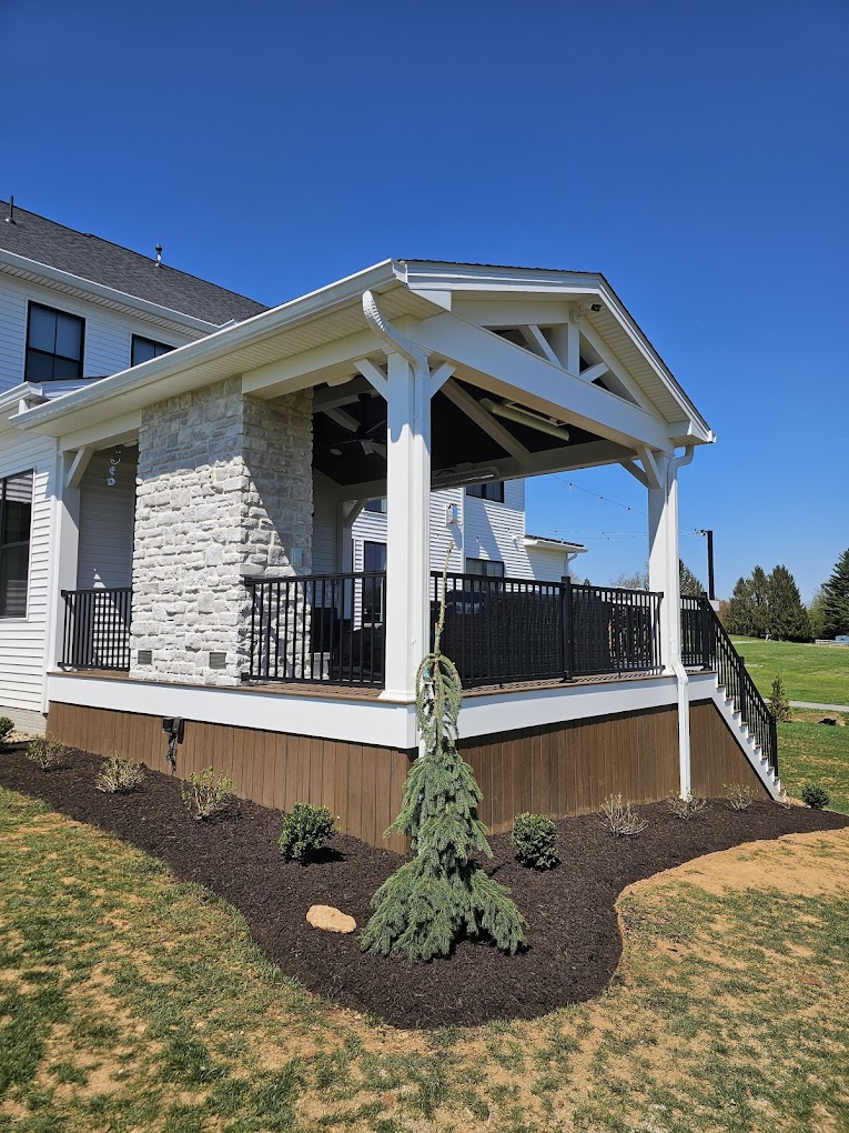 Layered foundation planting on a Harford County property by Oakfield Landscaping